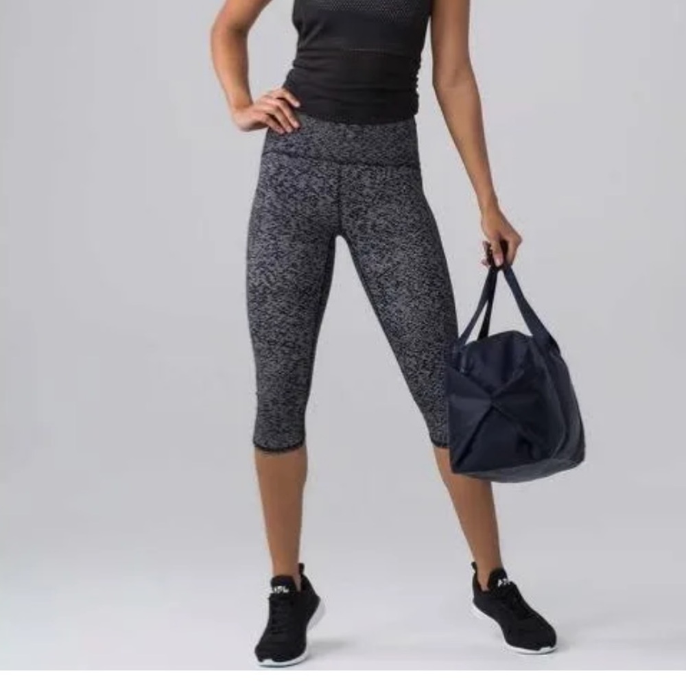 Lulu lemon Size 4 Train Times Crop 17 inches leggings. Black/white dots.